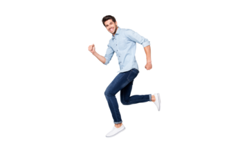 Full length body size photo of cheerful nice excited ecstatic man overjoyed with being able to jump and run in footwear high isolated over grey color background