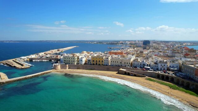Gallipoli - Italy, Apulia - landing aerial view of the northern old town with view of the harbor