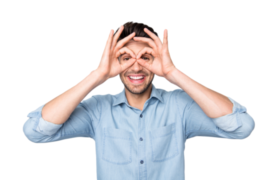 Portrait of positive funny funky guy have rest relax fooling with his careless dream dreamy friends make binoculars with fingers ok sign wear casual style clothes isolated over grey color background