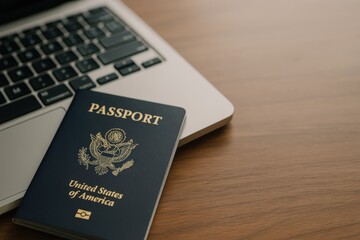 Close-Up of United States Passport on Wooden Table Next to Laptop with Keyboard Visible