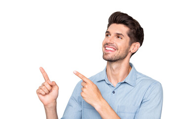 Close up photo of positive cheerful promoter man point index finger look demonstrate promotions...