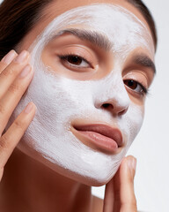 young woman with facial mask