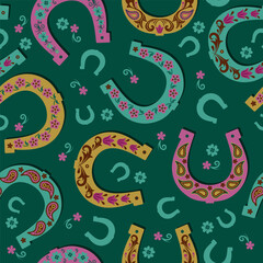 Seamless vector pattern with lucky horseshoes, clovers and paisley motifs on dark green. Folk art, 2026 Year of the Horse, St. Patrick's Day. Ideal for textiles, scarves, packaging.
