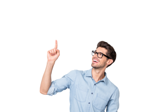 Photo of cheerful positive handsome attractive man pointing up for you to see novelty released recently smiling toothily isolated over grey color background