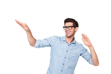 Naklejka premium Photo of cheerful attractive handsome resting man dancing smiling toothily wearing eyeglasses isolated over grey color background