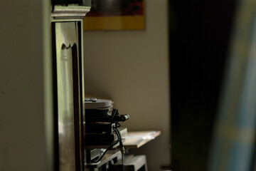A delightful glimpse into a cozy space featuring a charming vintage record player alongside a...