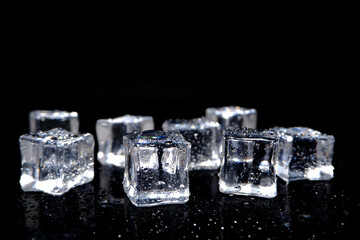 ice cubes closeup shot on black background 