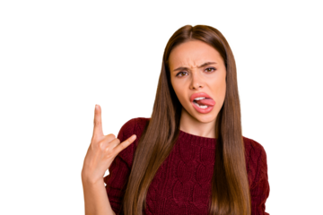 Close up photo of cute youth making horn signs fooling wearing maroon pullover isolated over yellow background