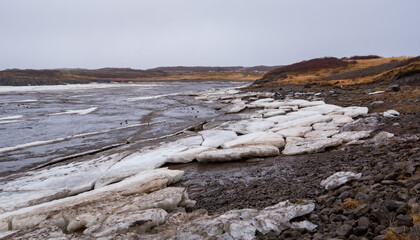 Icelandic Frozen lake with big ice cubes, Iceland, early in springtime. Icelandic Arctic landscape
