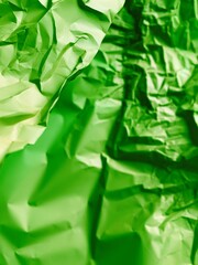 Neon green crumpled paper close up. Texture of vintage cardboard. Paper background. Copy space for your text