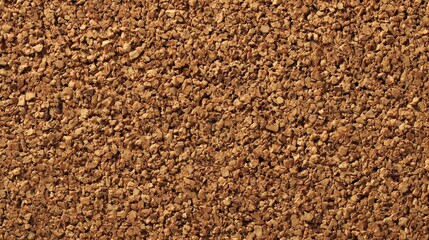 ecofriendly product design,Close-up of a textured cork surface showing natural brown granules tightly packed together.