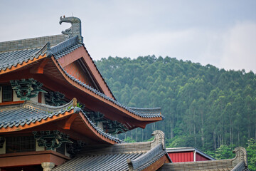 Ancient Temple Roof and Green Mountains