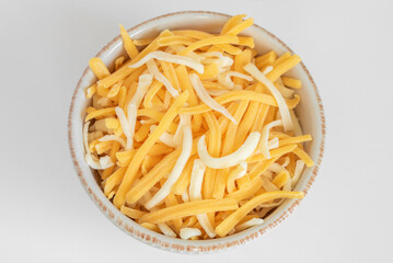 Shredded Cheddar and Colby Jack Cheeses in a Bowl