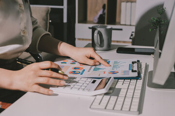 Expert woman asian female people review data number costing managerial account prepare monthly...