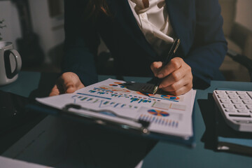 Expert woman asian female people review data number costing managerial account prepare monthly...