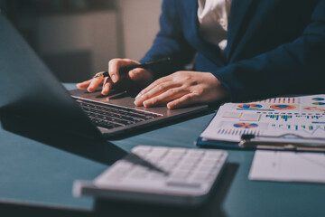 Expert woman asian female people review data number costing managerial account prepare monthly...