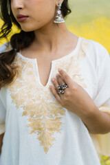 Girl in White dress posing in mustard fields, Shoot for kaar kash