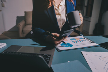 Expert woman asian female people review data number costing managerial account prepare monthly...