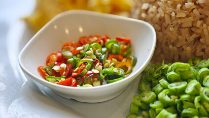 sliced chilli in white bowl
