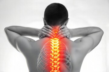 Man's neck highlighted in red, suggesting musculoskeletal distress, pain from spine, and potential injury