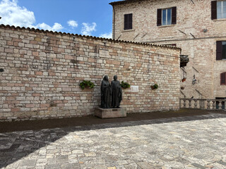 Bronze monument dedicated to the parents of  St. Francis, Assisi, Italy.