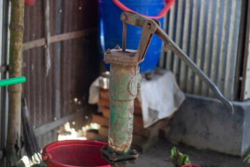 A tube well and its hand lifted from above