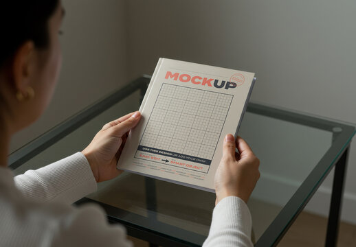 Hard Book Cover Mockup with Holding Hands and Person