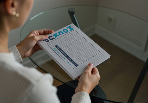 Hard Book Horizontal Cover Mockup with Holding Hands