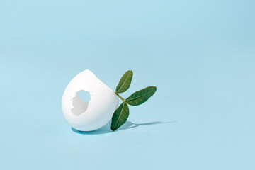 Creative Easter holidays decoration, pastel blue background