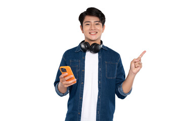 Portrait of Asian male student wearing headphones , using phone and posing on PNG background	