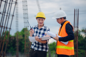 In the evening, engineers and contractors are inspecting the work using radio communication and...