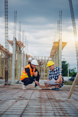 In the evening, engineers and contractors are inspecting the work using radio communication and...