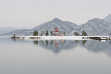lake and mountains in winter