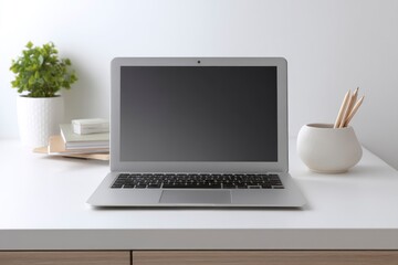 Fototapeta premium Minimalist Laptop Workspace: Serene, Modern Desk Setup
