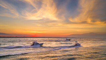 Headed to the deep sea fishing grounds at sunrise