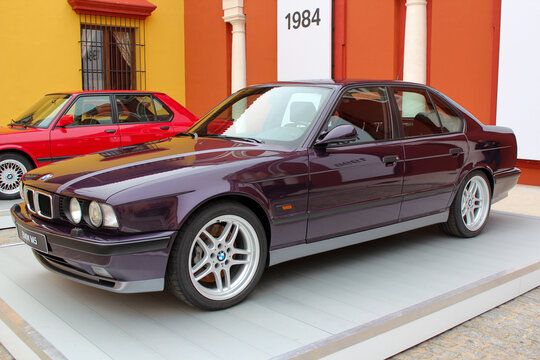 BMW M5: black wood color, E34, second generation in Seville - Spain - November 20, 2011.