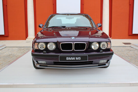 BMW M5: black wood color, E34, second generation in Seville - Spain - November 20, 2011.