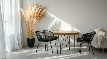 Modern dining area with a square wooden table and black chairs.