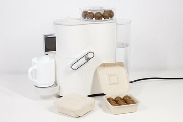coffee machine in the kitchen with coffee capsules