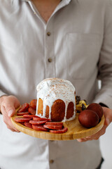 man holding tray with easter food