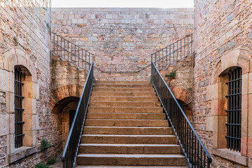 Obraz premium Stone staircase inside Montjuic Castle in Barcelona, Spain