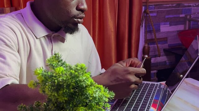 man using bank card for shopping online