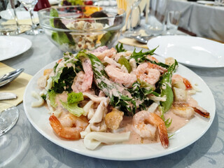 Seafood salad at a Restaurant Table