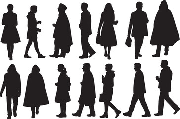 Silhouettes of people walking outdoors city street