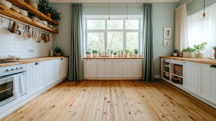 Obraz premium A bright and airy kitchen with wooden floors and light cabinets.
