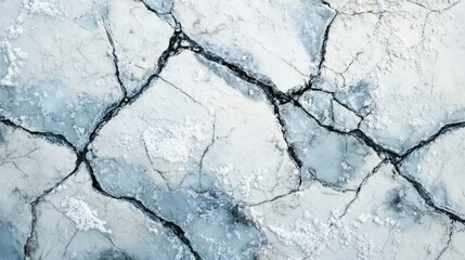 Obraz premium flat lay of cracked ice and snow in Greenland fjord, cool blues, whites, and light gray shadows