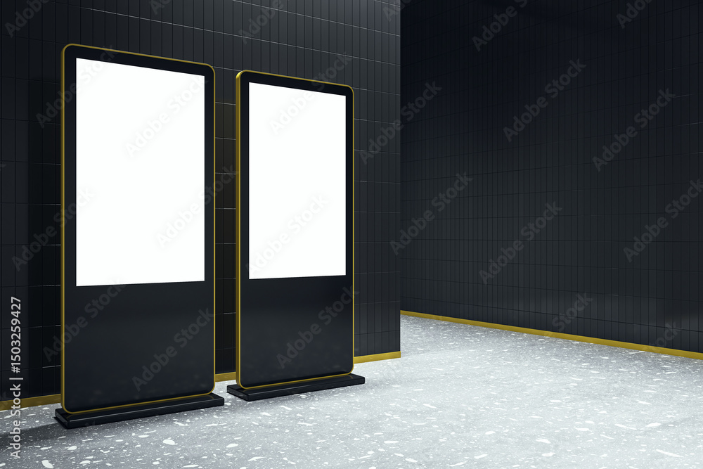 Poster Two vertical blank digital advertising screens with golden frames in modern black tiled corridor with terrazzo flooring and empty copyspace. 3D Rendering