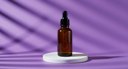 Naklejka premium Amber glass dropper bottle on purple background minimal product photography
