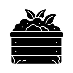Wooden crate with greenery and possible garden vegetables inside isolated icon