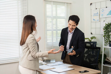 Professional Exchange. Colleagues sharing insights in a modern office.